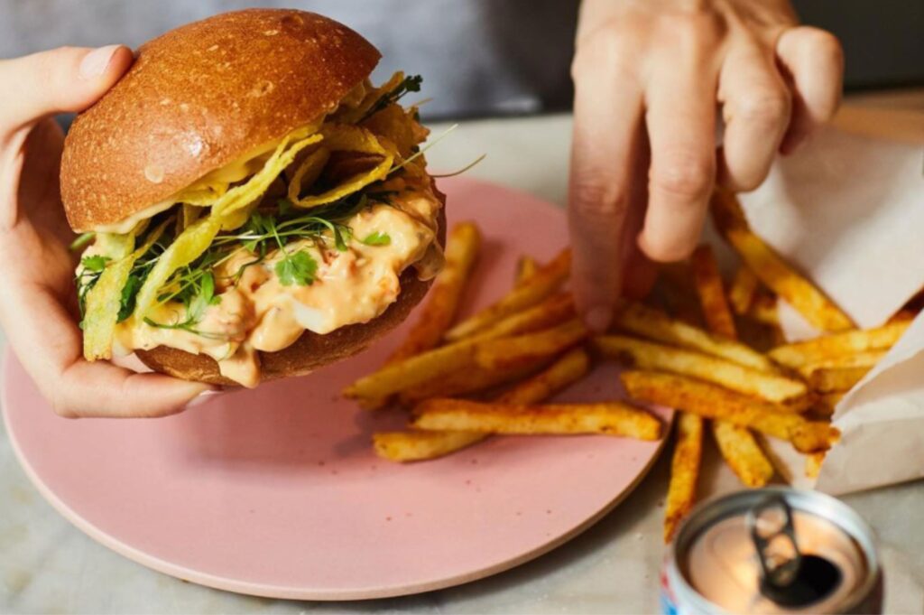 The internet is slating Brits for putting crisps in their sandwiches